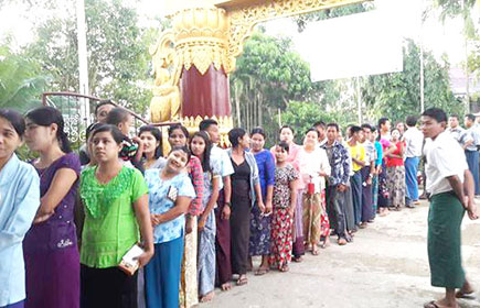Queues formed outside many polling stations in Myanmar.
