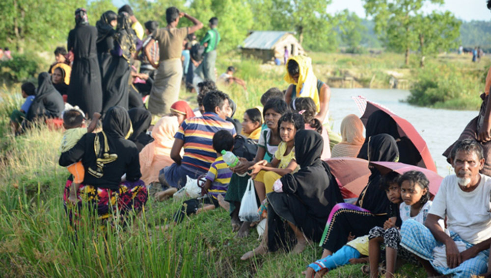 Rohingya people enter into Bangladesh after insurgents clashed with security forces in Myanmar’s northern Rakhine state, Aug. 30, 2017. Photo: Abdur Rahman/BenarNews