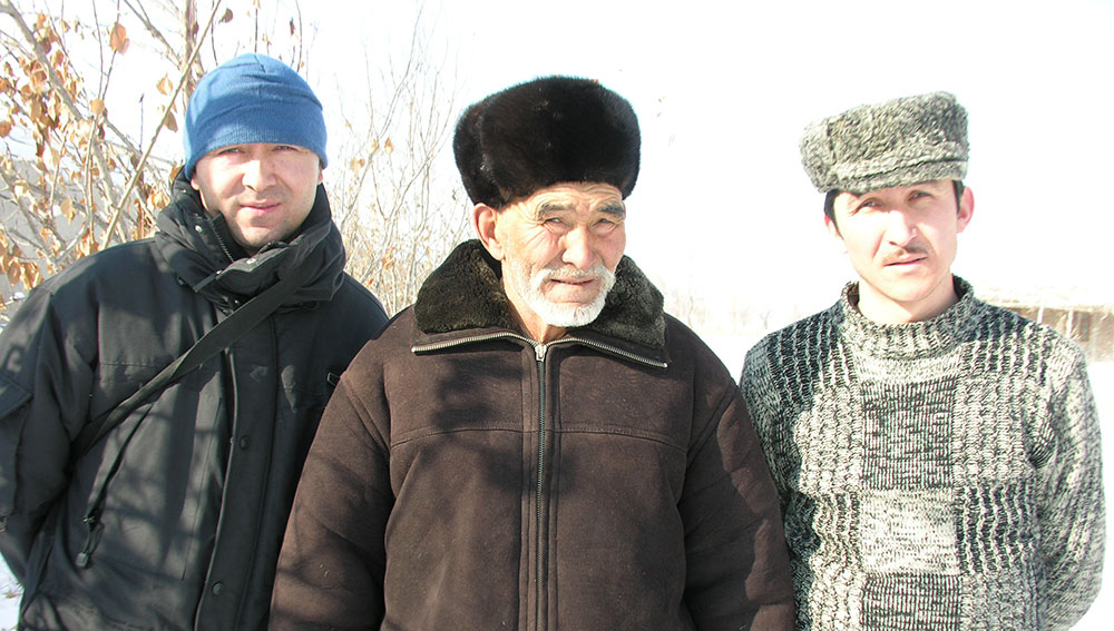 RFA Uyghur service reporter Mamatjan Juma (left) with his late father Juma Kadir (center) and brother Ahmetjan (right) in Kashgar, Xinjiang Uyghur Autonomous Region, China in 2005.
