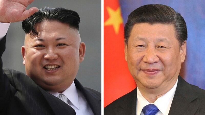 中国国家主席习近平（右）和朝鲜最高领导人金正恩。（美联社）