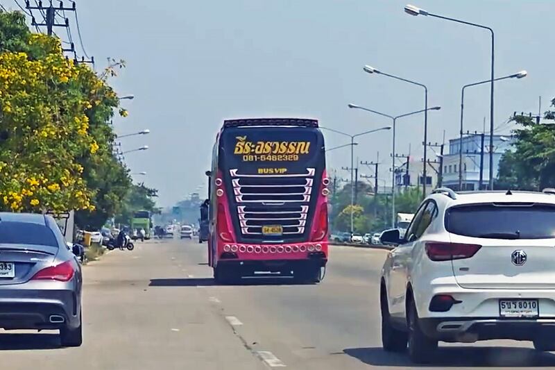 The bus carrying Vietnamese monk Thich Min Tue departs the Mae Sot border gate between Thailand and Myanmar, March 4, 2025.