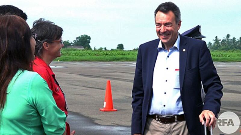 Paul Maurer (R), president of the International Committee of the Red Cross, arrives in Sittwe, capital of western Myanmar's Rakhine state, Aug. 26, 2018.