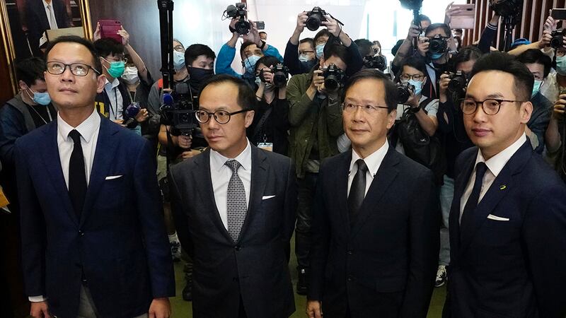 2020年11月11日在香港立法會舉行的新聞發布會上，（從左）郭榮鏗、梁繼昌、郭家麒、楊岳橋四位立法會議員。（美聯社）