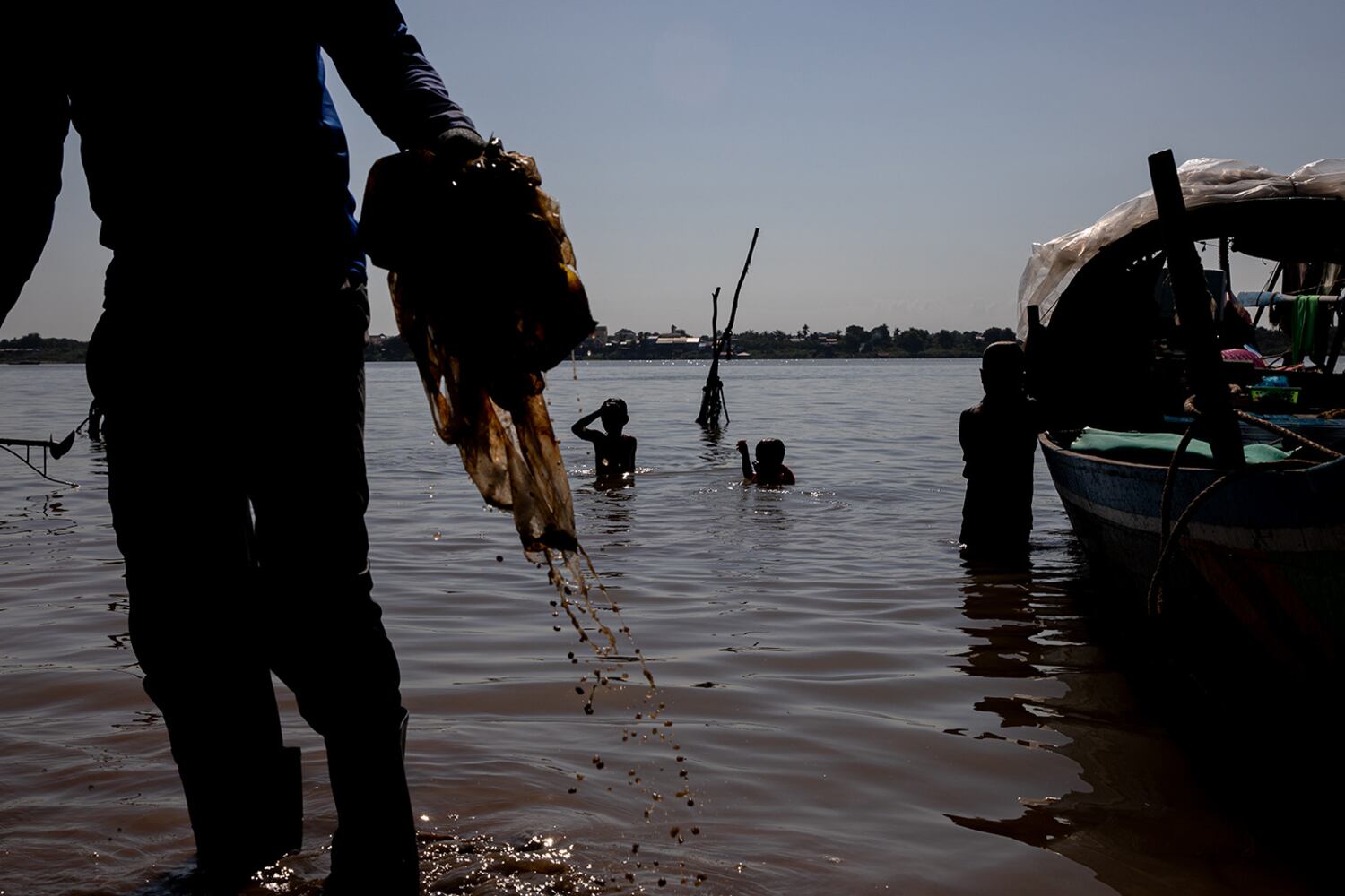 Along the Mekong, fishers and farmers battle a plastics catastrophe