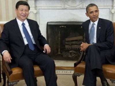 图片： 时任中国国家副主席的习近平（左）与美国总统奥巴马第一次在白宫会面。 （法新社图片）