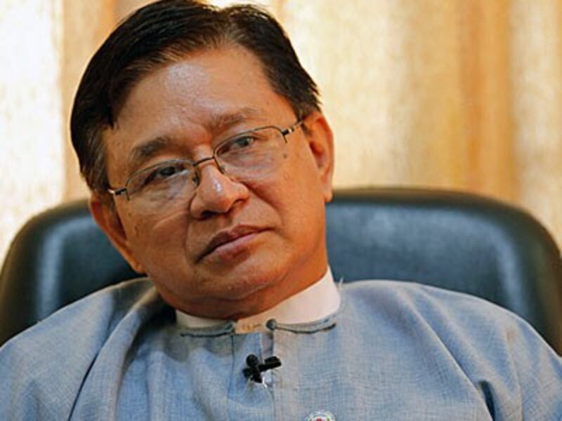 Yu Lwin Aung, a member of Myanmar's Human Rights Commission, talks to reporters at the commission's office in Yangon, April 23, 2018.