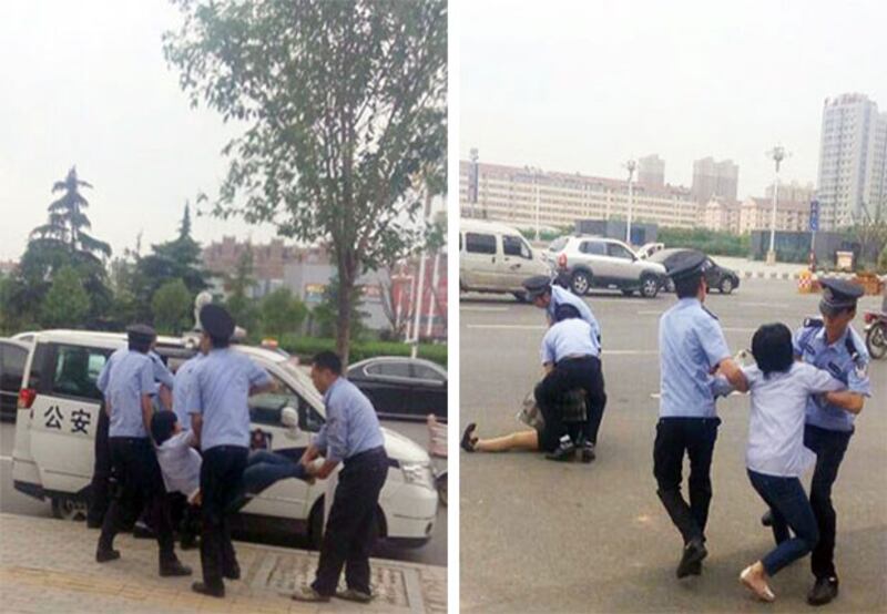 2015年5月21日,廿多名業主再到巿政府要求釋放被關押業主,警方抓走兩名業主。 (照片來自維權人士)