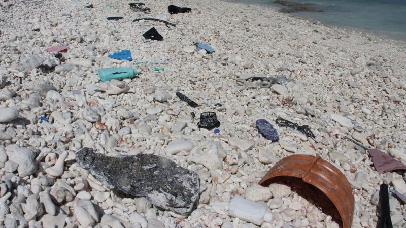 Plastic trash is seen strewn across a beach at Wake Island in the Pacific Ocean, where residents continually comb the beach for waste but more washes up daily, Feb. 2, 2018.