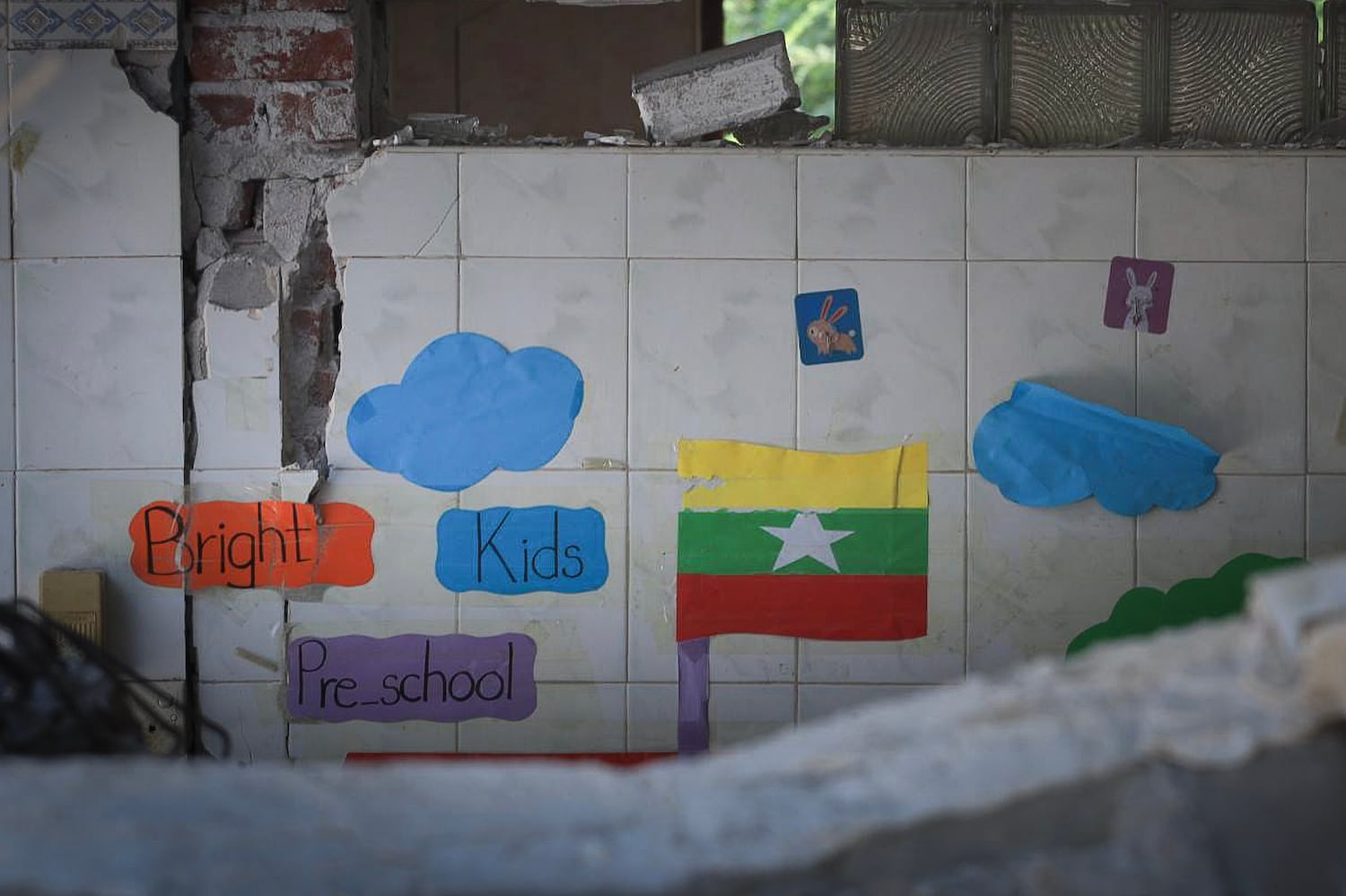 The inside of a pre-school is seen through a collapsed wall in Sagaing city, Myanmar, on April 24, 2025, four weeks after Myanmar's devastating earthquake.