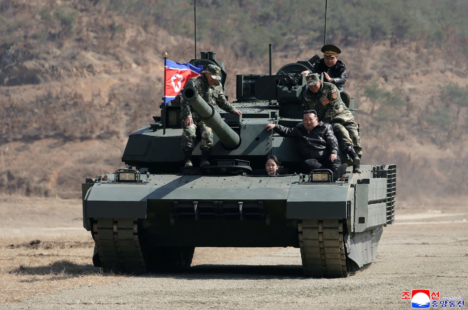 North Korean leader Kim Jong Un, front right, his daughter Ju Ae, and other soldiers on a tank at a military training base in North Korea, on March 19, 2026.
