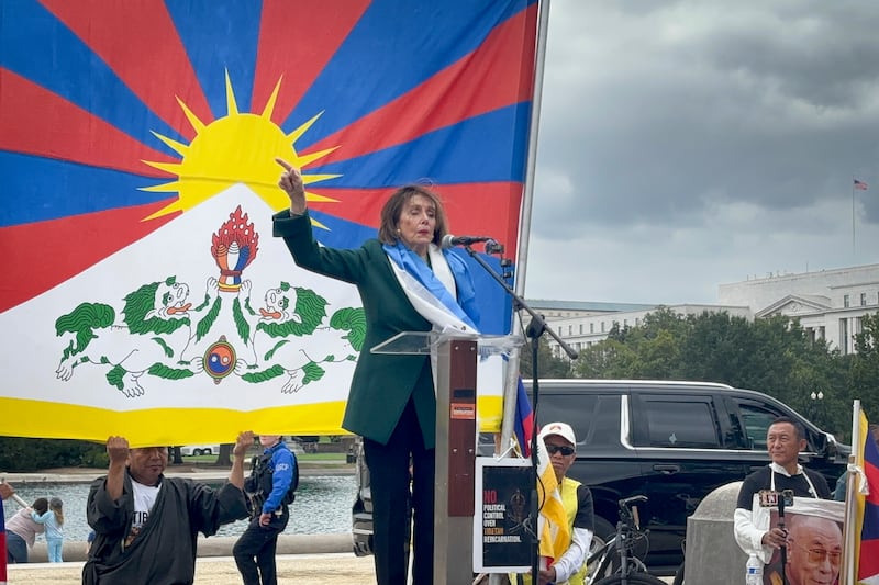 Former House Speaker Nancy Pelosi speaks to Tibetan demonstrators outside the U.S. Capitol in Washington, Sept. 24, 2026.