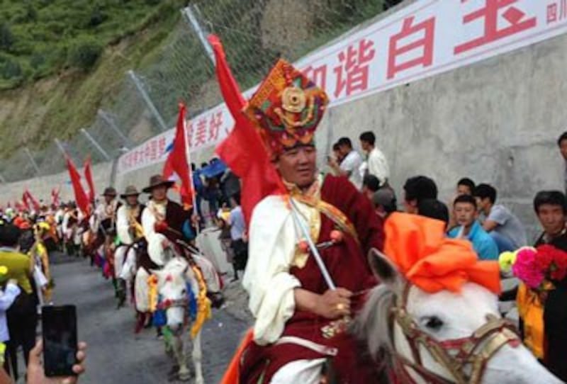 Horsemen in traditional costume parade in Palyul, July 28, 2014. Credit: RFA listener