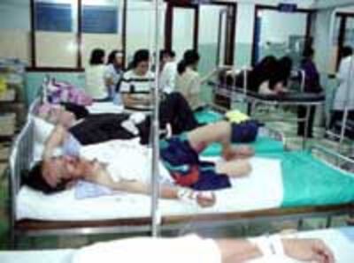 Tham nhũng không chỉ xuất hiện trong hệ thống quyền lực, mà cả trong mạng lưới dịch vụ xã hội nữa, nhất là trong ngành y tế. AFP Photo