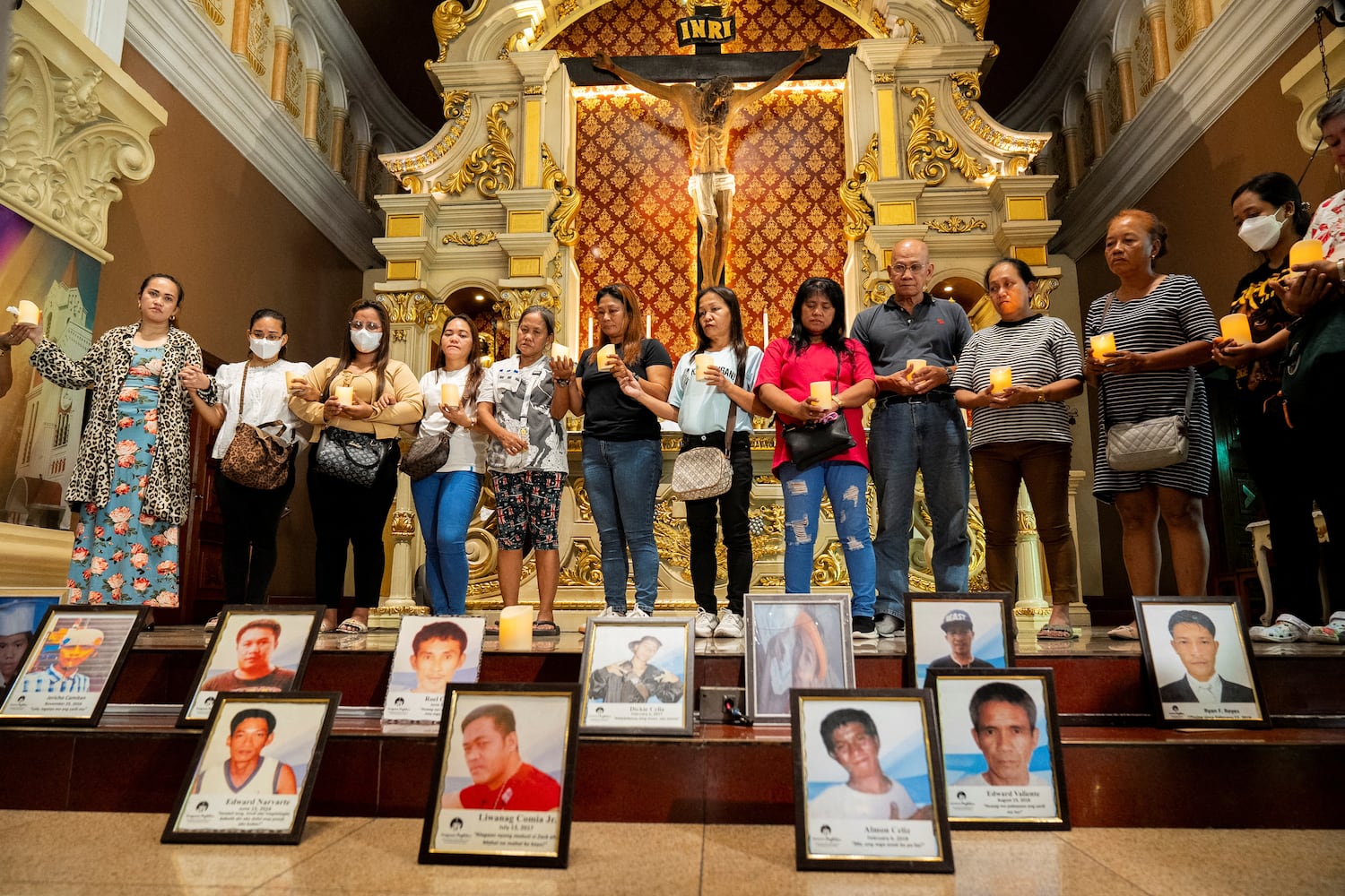 Relatives of drug war and extrajudicial killing victims attend a mass following the arrest of former Philippine President Rodrigo Duterte, in Quezon City, Philippines, on March 11, 2025.