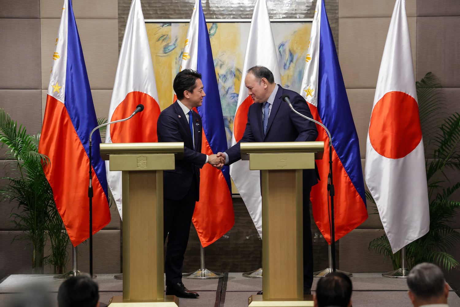 Japan's Defense Minister Shinjiro Koizumi, left, and the Philippines' Defense Secretary Gilberto Teodoro Jr., after their meeting in Manila, May 5, 2026.
