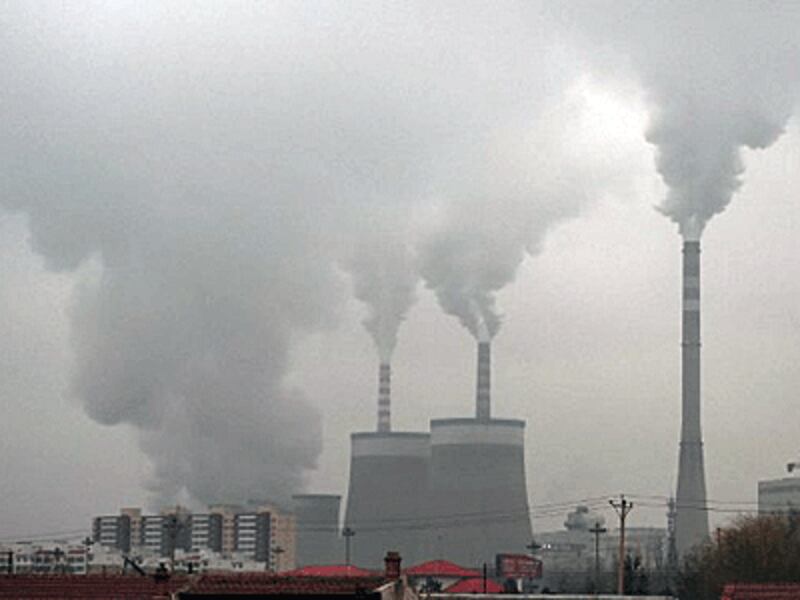 Smoke belches from a coal-fired power station near Datong in northern's China's Shanxi province, Nov. 19, 2015.