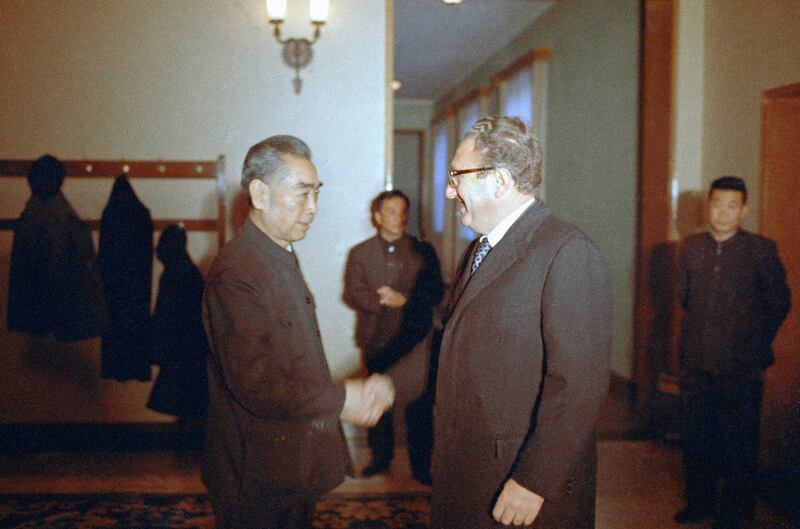 Secretary of State Henry Kissinger greets China's Premier Zhou Enlai before the start of their meeting in Beijing, Nov. 12, 1973. (Harvey Georges/AP)