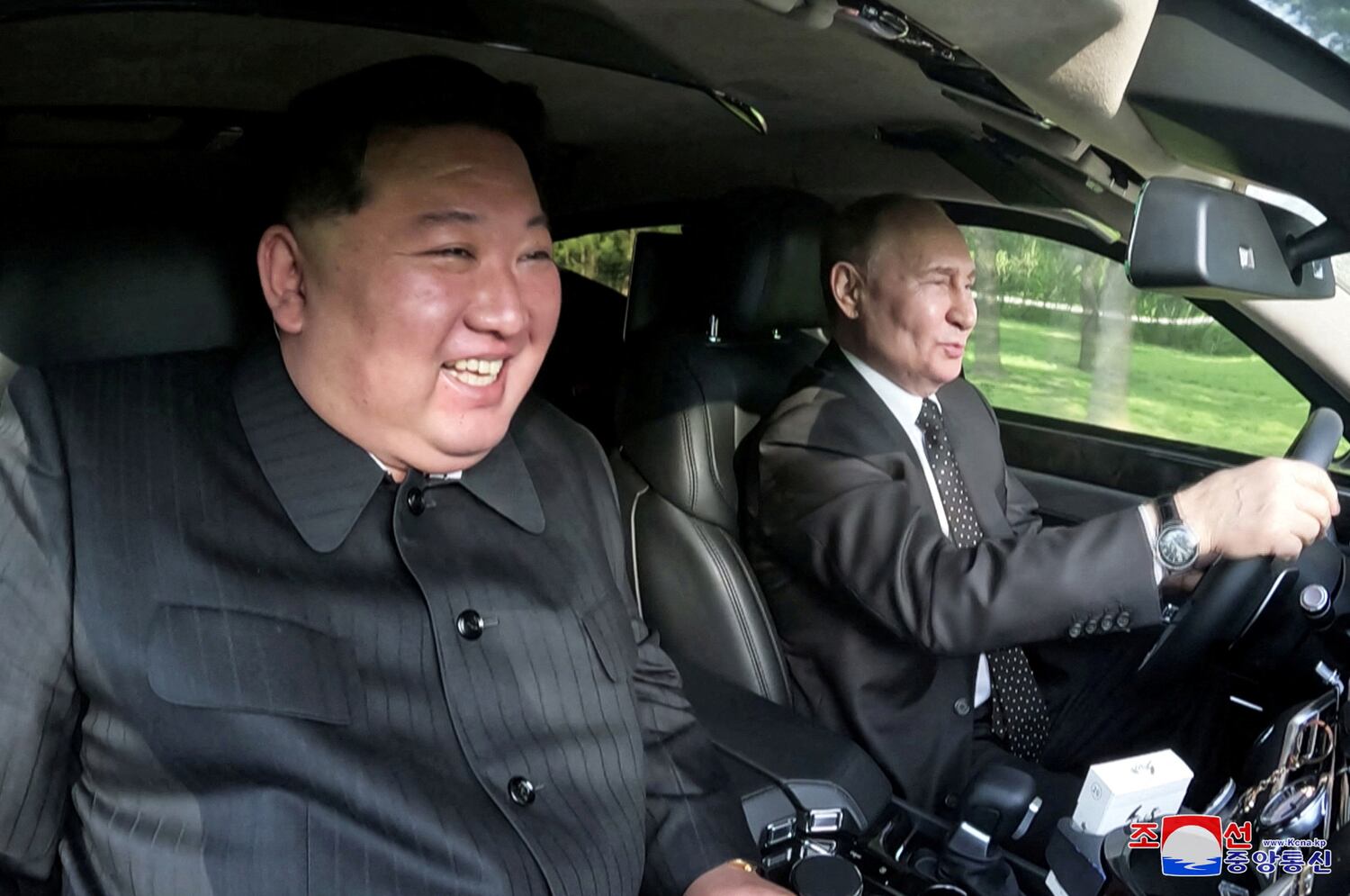 Russia's President Vladimir Putin and North Korea's leader Kim Jong Un take a drive in an Aurus car in Pyongyang, in this image released June 20, 2024.