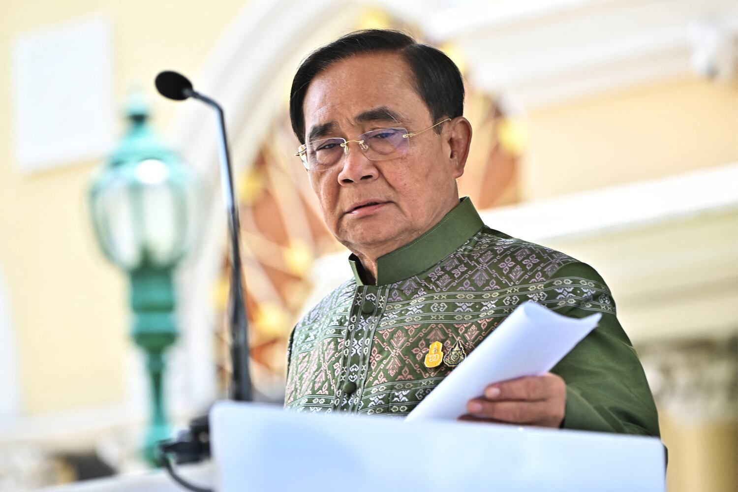 Then-Thai Prime Minister Prayuth Chan-o-cha speaks to journalists after a cabinet meeting at Government House in Bangkok, May 16, 2023. (Lillian Suwanrumpha/AFP)