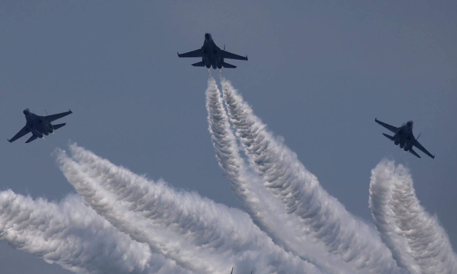 Indonesian air force Sukhoi jet fighters seen during celebrations of the 72nd anniversary of the Indonesia military, in Cilegon, Banten province, Indonesia, Oct. 5, 2017.