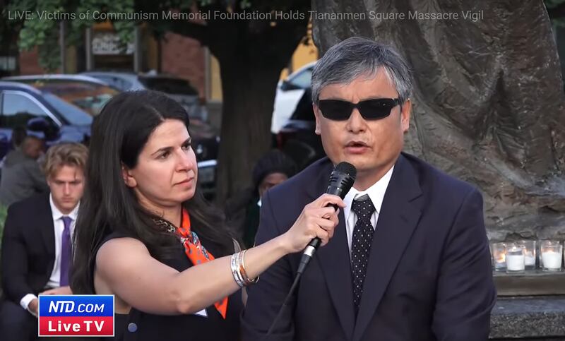 盲人维权人士陈光诚在集会上强调，结束共产党的专制政体才是中国实现民主的唯一解决之道。（视频截图/NTD.com）