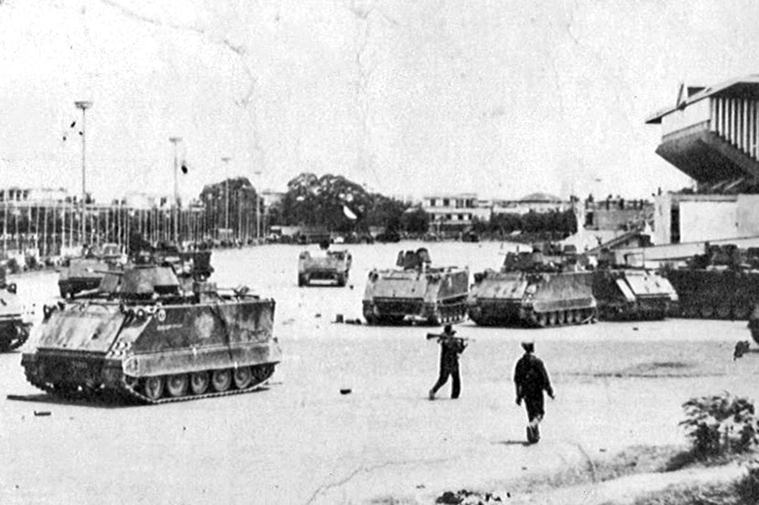 Khmer Rouge forces post armored vehicles at the National Olympic Stadium in Phnom Penh, April 17, 1975.