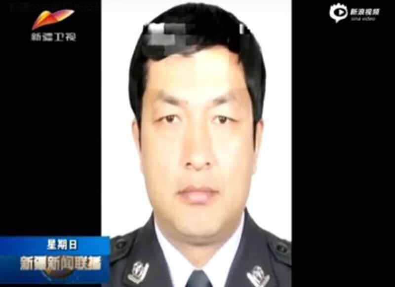 A screen grab from a state media report describing Memet Toxtiniyaz's role in a manhunt for suspects of the coal mine attack. Credit: Sina Video