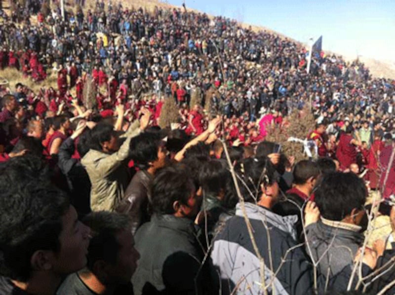 Part of the large crowd that attended Dorjee Lhundup's cremation ceremony.