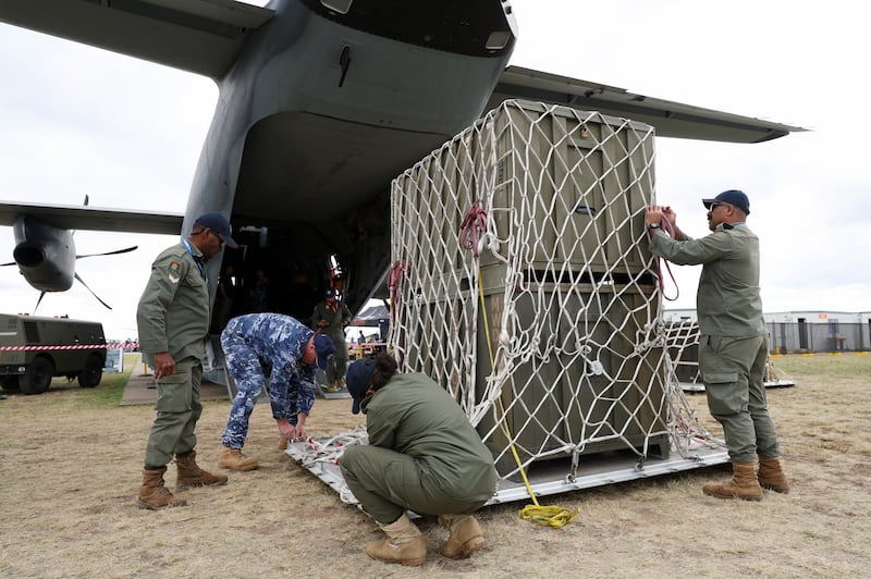 Republic of Fiji Military Forces personnel practice servicing cargo for transport with a member of the Royal Australian Air Force during the Australian International Airshow in Avalon, Australia March 26, 2025.