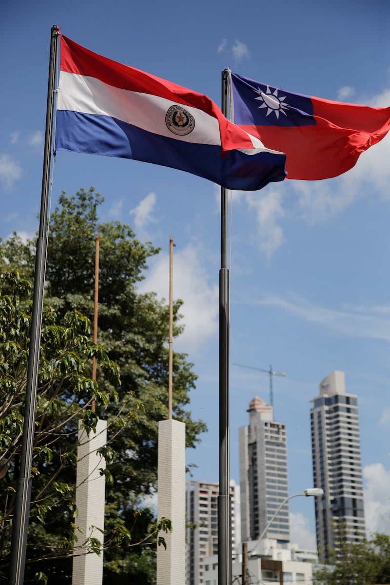 The national flags of Paraguay and Taiwan flutter outside the building housing Taiwan's embassy, in Asuncion, Paraguay, Feb. 25, 2026.