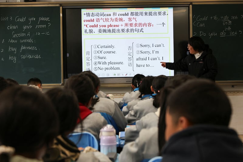 Students attend class at Nyingchi City Bayi District Middle School, during a government-organized tour, in Nyingchi, Tibet Autonomous Region, March 31, 2025.