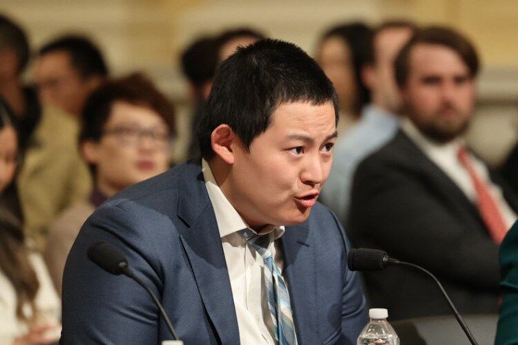 Georgetown University law student Zhang Jinrui, speaking to the House Select Committee on the Chinese Communist Party, in Washington, D.C., on Wednesday, says he started being approached, warned and filmed by other Chinese students on campus after speaking out against China’s zero-COVID policies. (House Select Committee on the Chinese Communist Party)