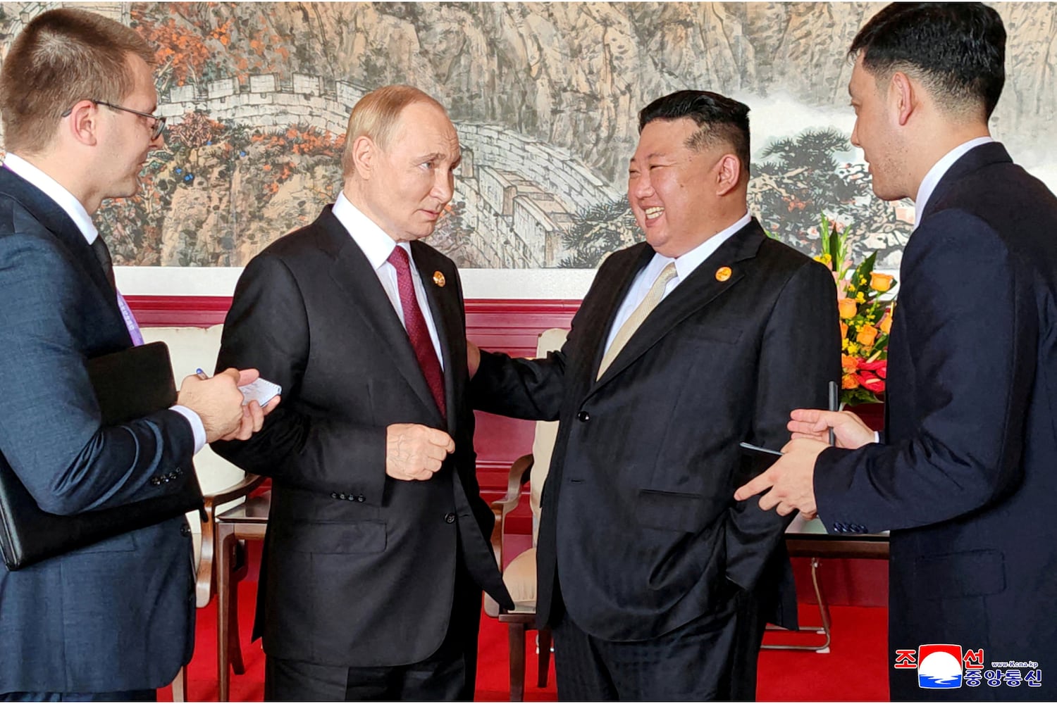 North Korean leader Kim Jong Un speaks with Russian President Vladimir Putin during their visit to Beijing to attend China's commemoration of the 80th anniversary of the end of World War Two, in Beijing, China, September 3, 2025.