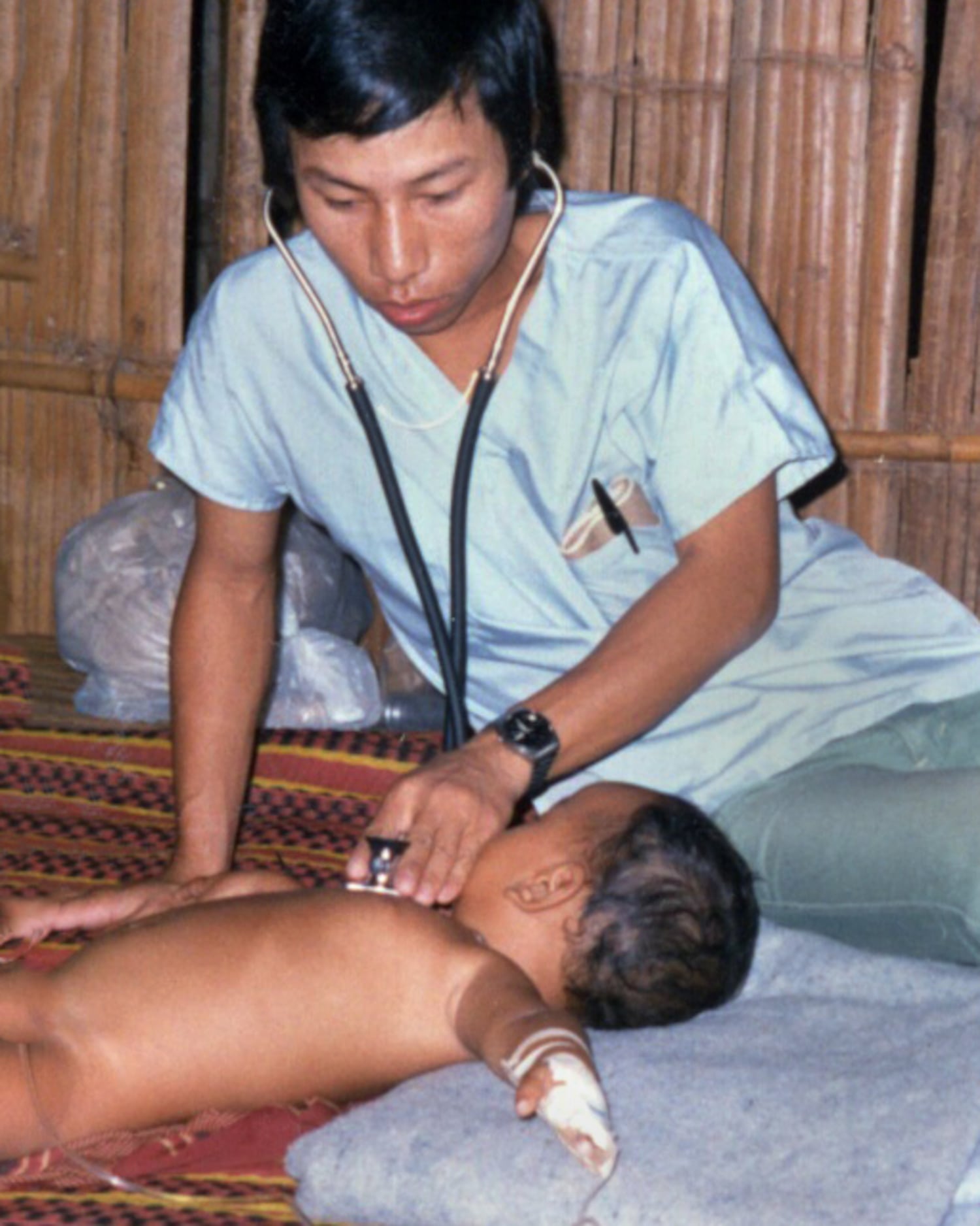 Sum Sok Ry works as a medic at a hospital run by the American Refugee Committee in 1986.