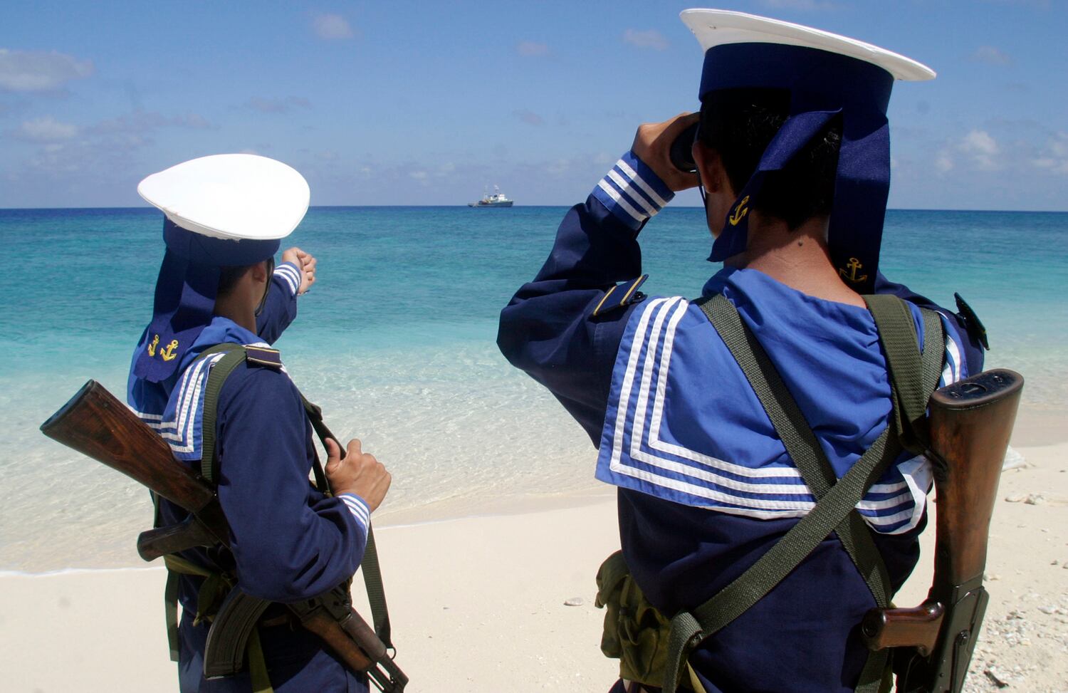 Vietnamese navy personnel patrol on the Spratly islands in this April 13, 2010 picture.