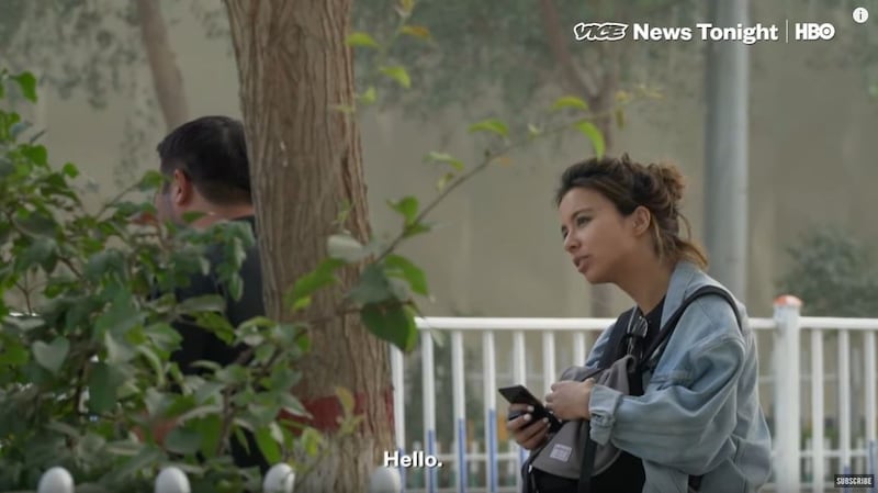 In a screen grab from her video report, Isobel Yeung confronts a man she believes to be a plainclothes officer assigned to trail her in Hotan. Credit: Vice News/HBO