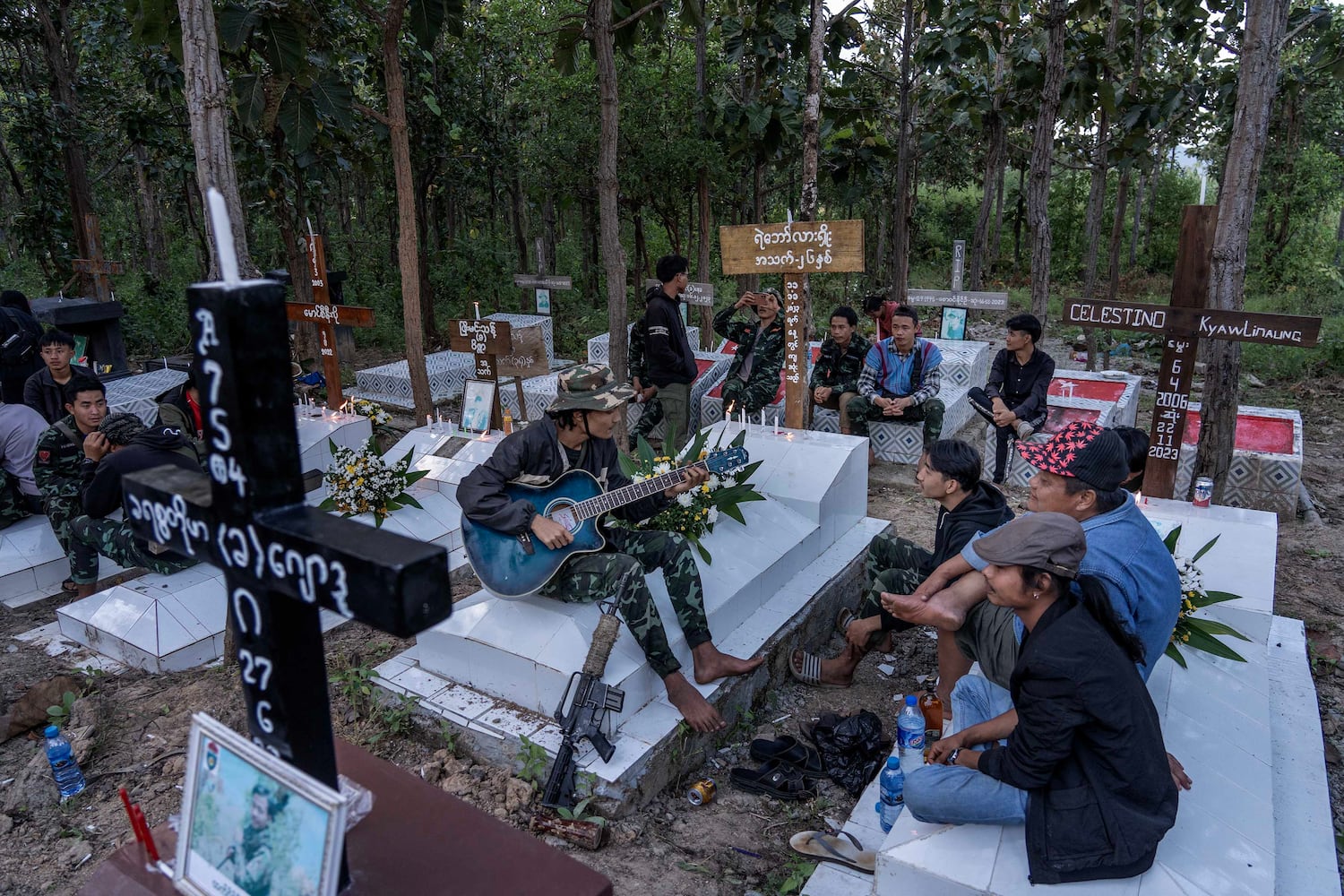 At a secret Myanmar cemetery, family of anti-junta fighters mourn their dead