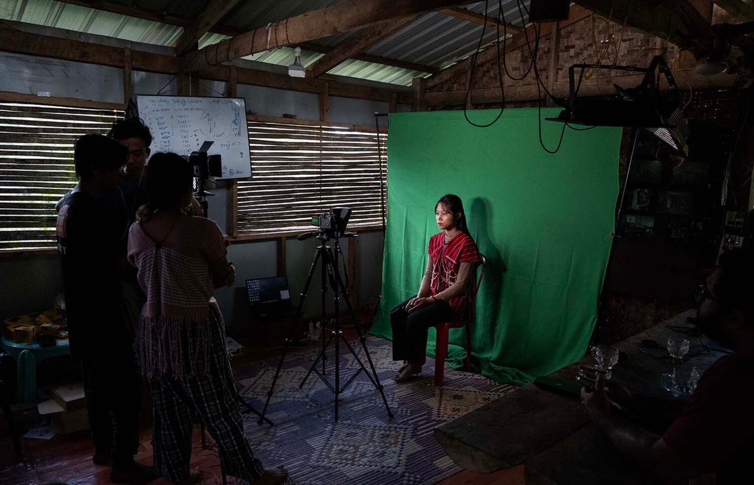 Presenter Myar Moe prepares for a newscast on FederalFM at its secret broadcast center in Demoso, Kayah state, Myanmar, Nov. 1, 2024.