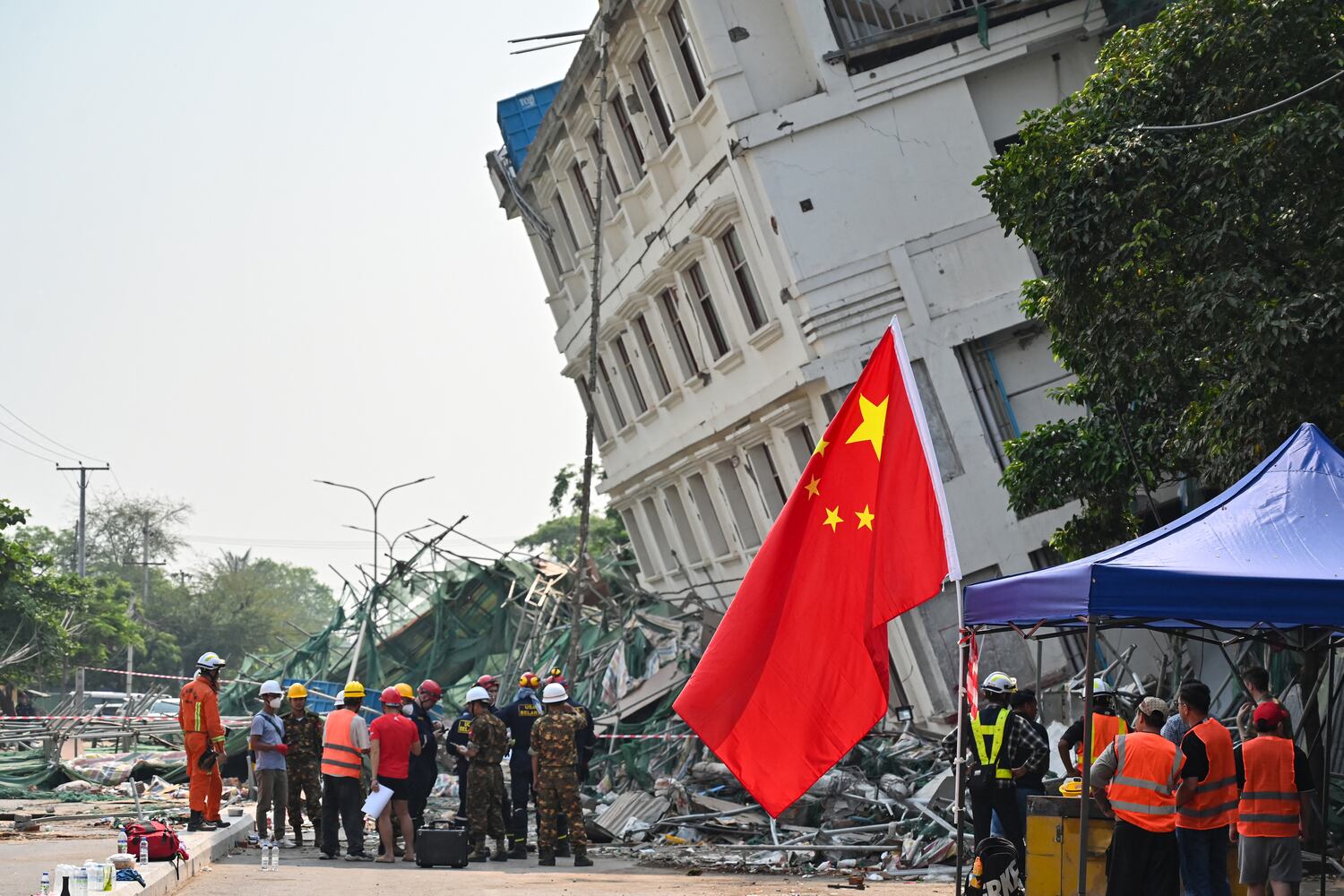 China and Belarus rescue teams at a collapsed building in Mandalay, April 2, 2025, five days after a major earthquake struck central Myanmar.