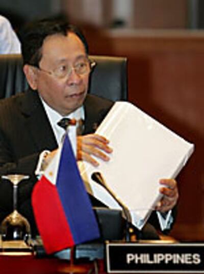 ဖိလိပိုင် ိံိုင်ငူံခားရေးဝန်ဋ္ဌကီး အယ်လ်ဘာတို ႟ိုူမလြို။ (Photo: AFP)