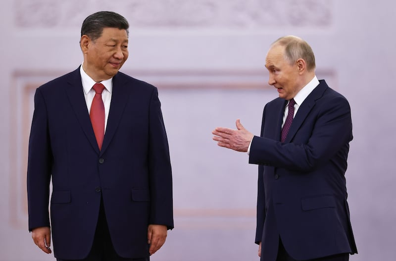 Russian President Vladimir Putin and Chinese President Xi Jinping attend a welcoming ceremony at the Kremlin in Moscow, Russia, May 8, 2025.