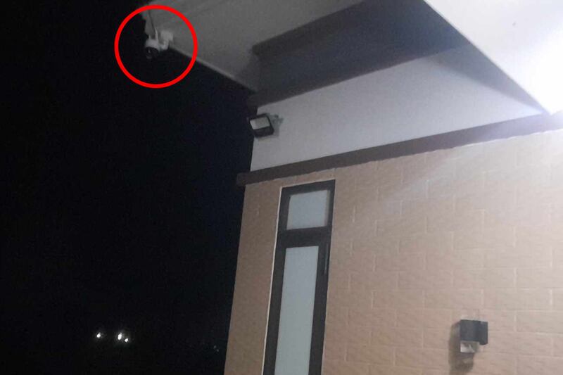 A surveillance camera, circled in red, at the home of Vu Quang Thuan, a former Vietnamese political prisoner.