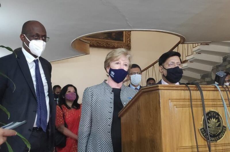 Senior UNHCR officials Gillian Triggs (center) and Raouf Mazou (left) respond to questions from reporters in Dhaka as Bangladesh Foreign Minister A.K. Abdul Momen looks on, June 2, 2021. Credit: BenarNews