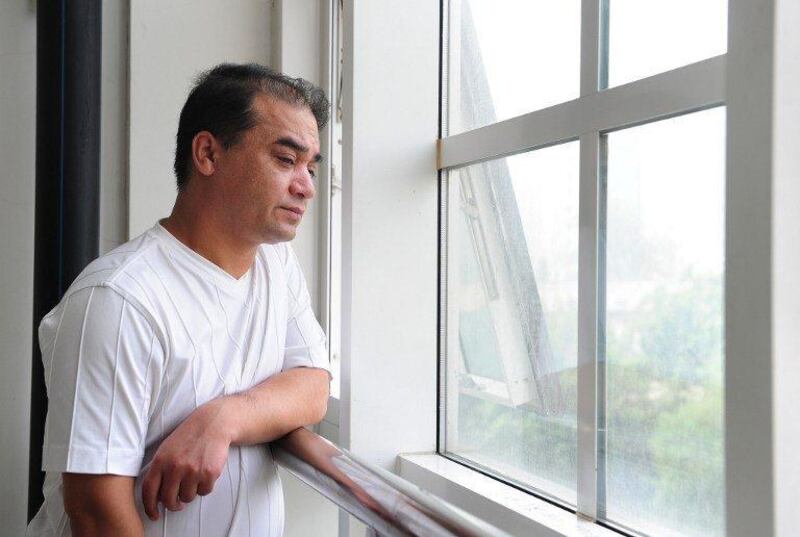 图片：前中央民族大学副教授伊力哈木•土赫提（法新社）