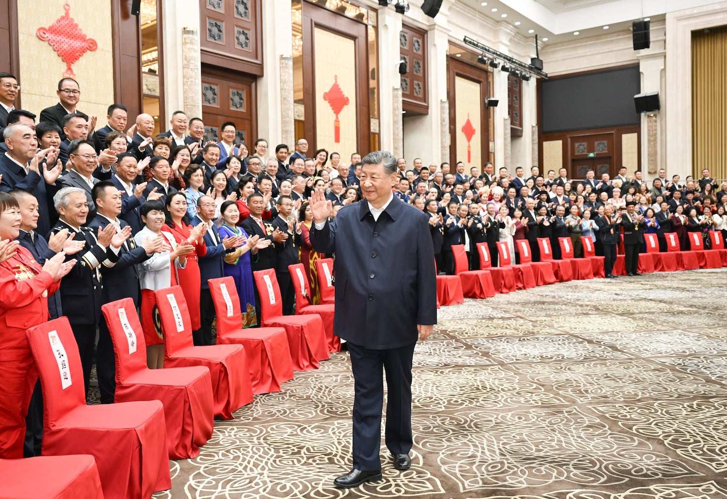 In this Chinese government image that could not be independently verified, President Xi Jinping, meets with representatives from ethnic groups in Urumqi, Xinjiang Autonomous Region, Sept. 23, 2025. (Xie Huanchi/Xinhua via Getty Images)