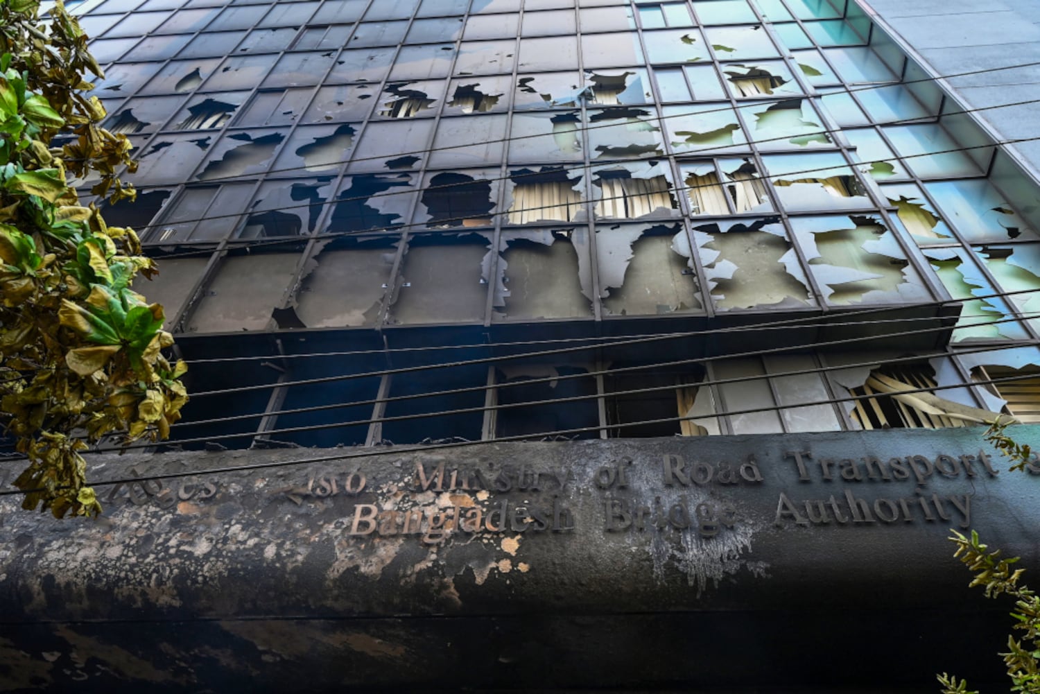 A burned government building is pictured on July 19, 2024, after agitators set it on fire during civil unrest in Bangladesh. (Munir Uz Zaman/AFP)
