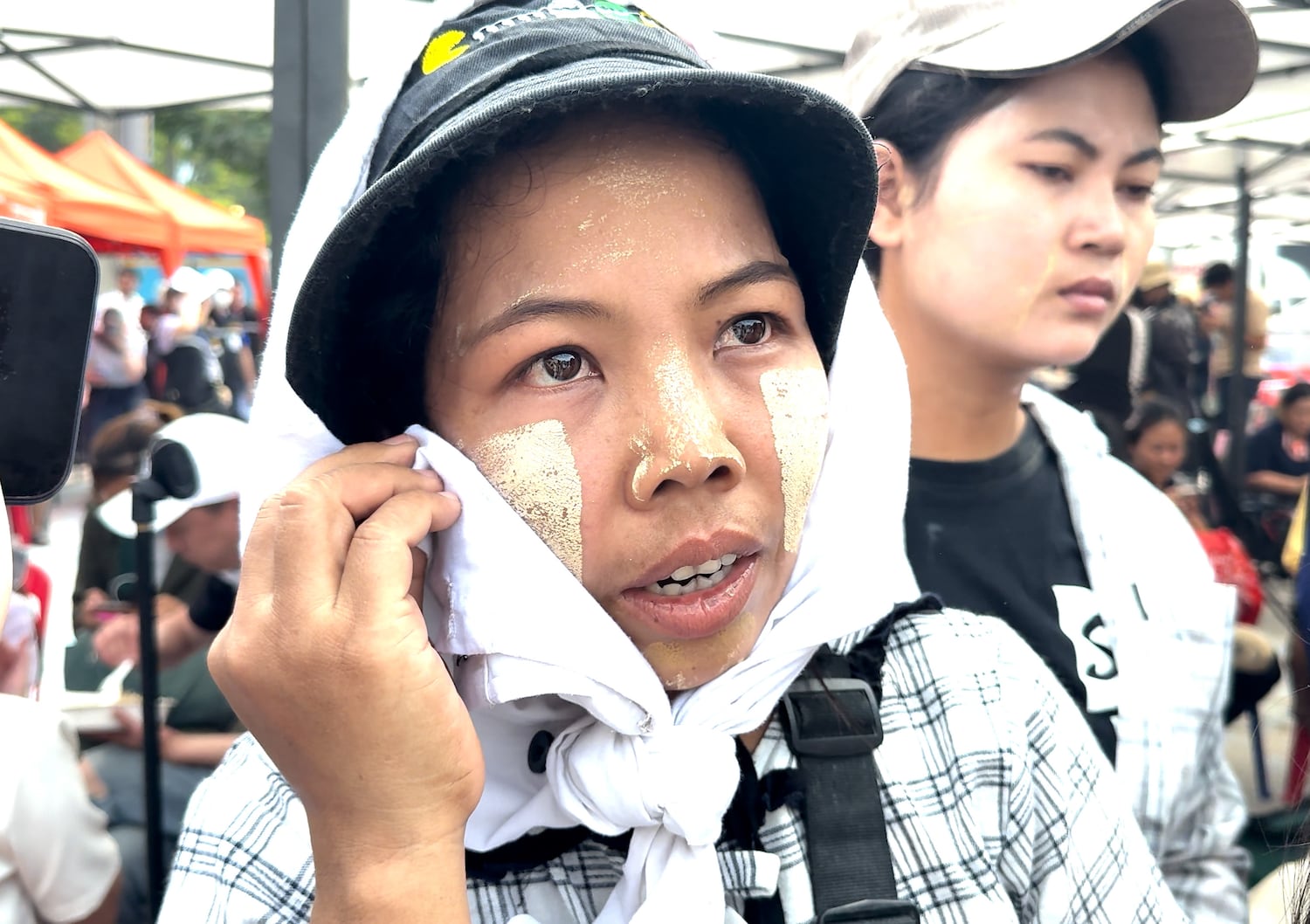 Hnin Nu Yee, a construction worker who escaped a high rise collapse in Bangkok caused by a powerful earthquake in Myanmar, is pictured in this image from video speaking to a reporter in Bangkok, Thailand, Mar. 29, 2025.