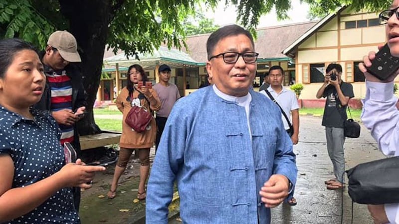 Rev. Hkalam Samson (C) of the Kachin Baptist Convention leaves Myitkyina Township Court in Myitkyina, capital of northern Myanmar's Kachin state, Sept. 9, 2019.