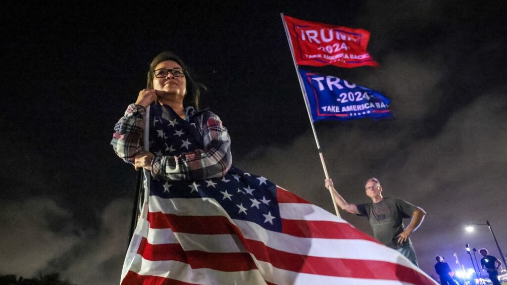 Supporters of Republican presidential candidate Donald Trump gather near his Mar-a-Lago resort in Palm Beach, Florida, on Election Day, November 5, 2024.
