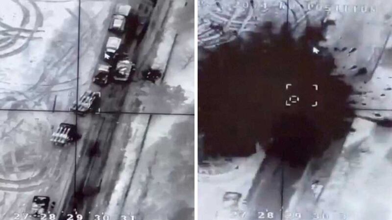 Images taken from video released Feb. 27, 2022, show a drone strike on what are reportedly Russian Buk anti-aircraft missile system vehicles on a road near Malyn, Zhytomyr Region, Ukraine. (Handout via Reuters)